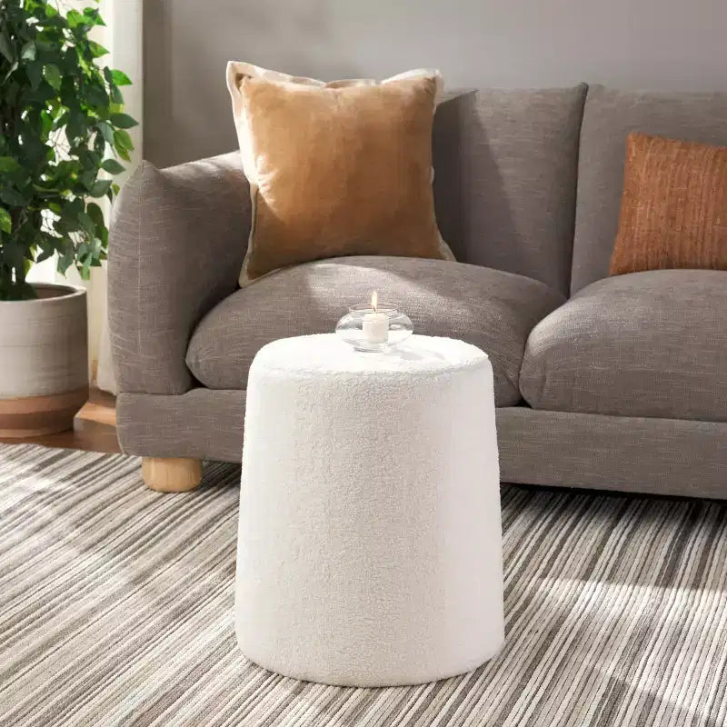 Round Upholstered Ottoman – Ivory